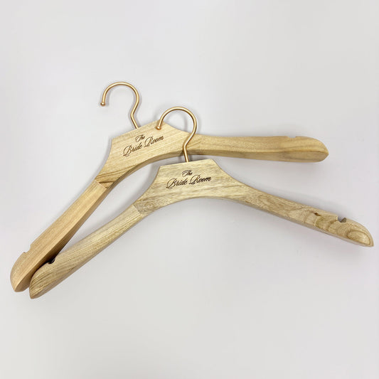 The Finishing Touch: Elevate Your Boutique Display with DE-LIANG Camphor Wood Wide-Shoulder Hangers
