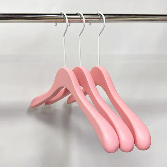 Why Luxury Pink Wooden Hangers Are the Secret to an Organized and Stylish Closet？