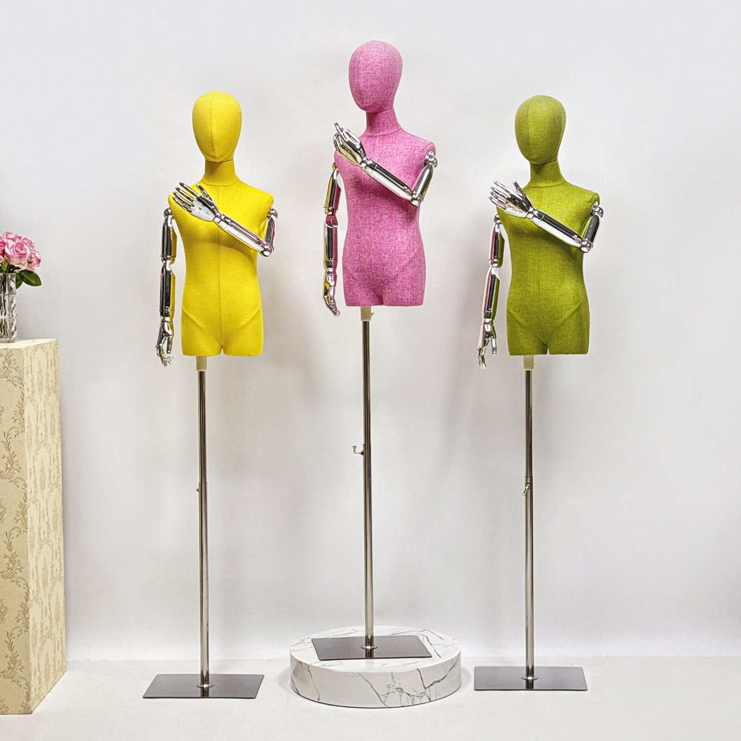 Linen-covered kids mannequin for clothing display