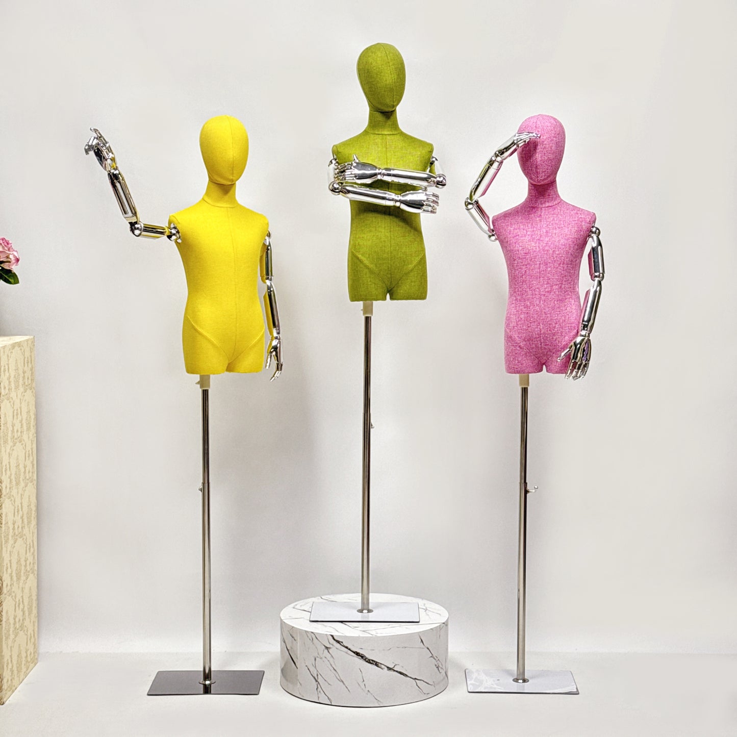 Linen-covered kids mannequin for clothing display