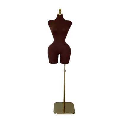 a mannequin on a stand on a white background