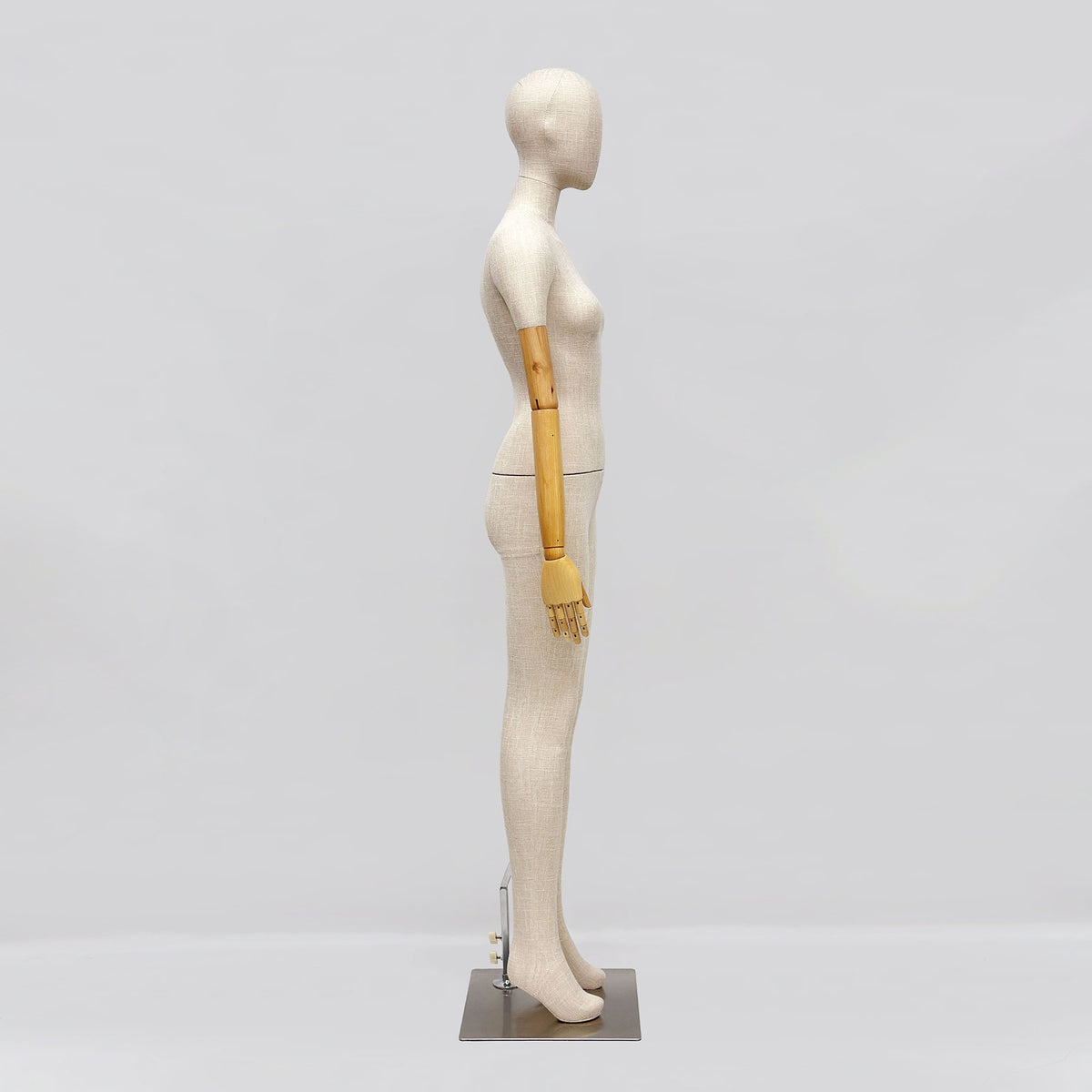 Side view of female mannequin displaying clothing fit