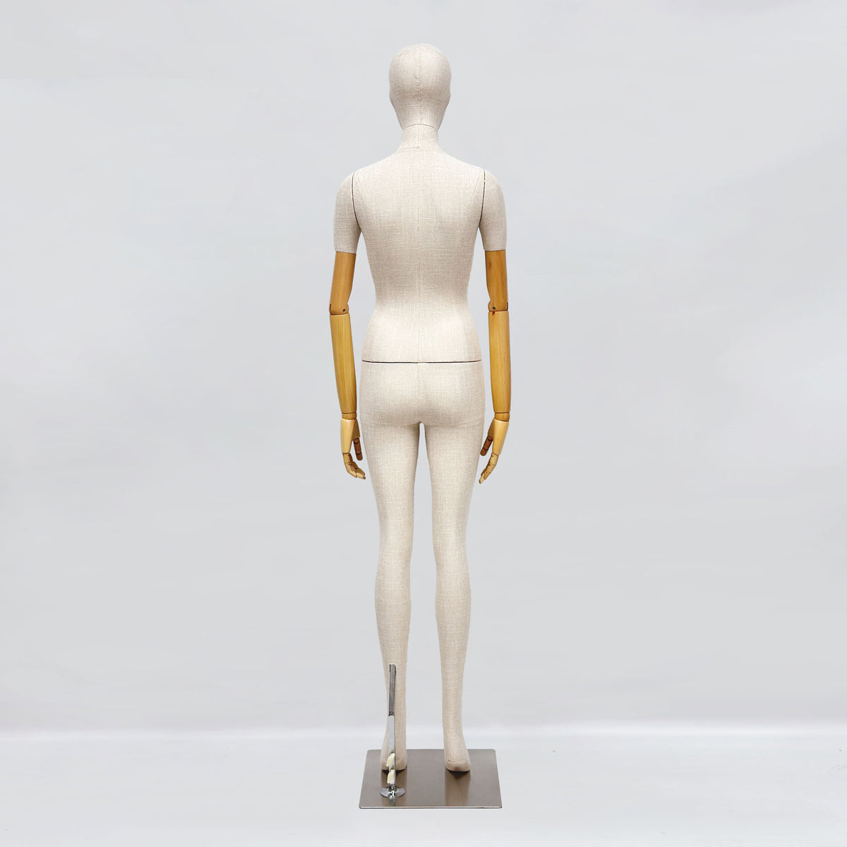 Professional female display mannequin with beige linen fabric covering 1
