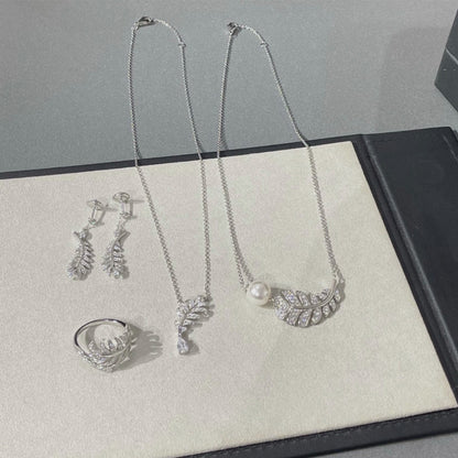 Joyería artesanal con plumas de plata: elegantes pendientes, anillos y collares para mujer, accesorios de moda para vestir y regalos para el Día de la Madre.