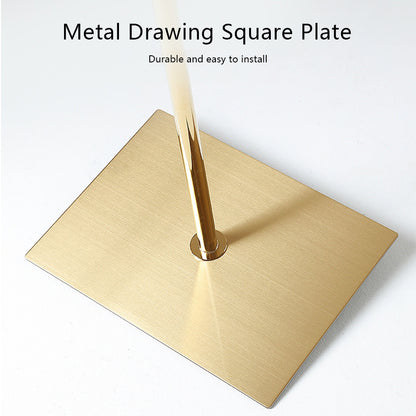 a metal drawing square plate with a pen sticking out of it